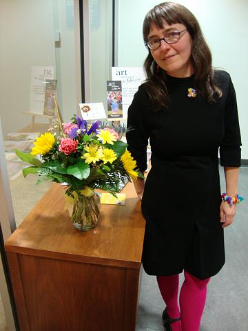 polychrome opening night (19).JPG - Lara with flowers that Nellie (her mother) sent.